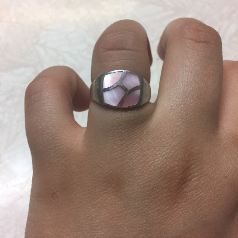 Size 6.5-7 Sterling silver with pink stones ring